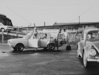 Holidaymakers at a Motorail terminal  1966.