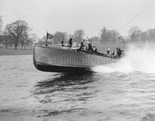 Amy Johnson in a new speedboat  Welsh Harp  Hendon  1 April 1931.