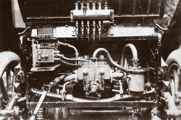 Engine of a Peugeot motor car  1900.