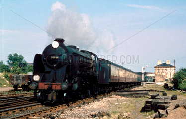 Steam locomotive 'Cranleigh' with a passeng