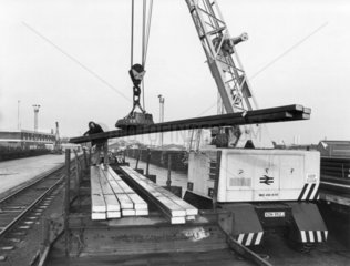 BR road crane with magnet loading steel bars  December 1977.