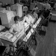 A line of women stitching publications at EJ Arnold and Sons  Leeds  1962.