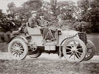 C S Rolls behind the wheel of his 24 hp Panhard with two passengers  1902.