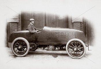C S Rolls behind the wheel of his 100 hp Mors Racer  1904.