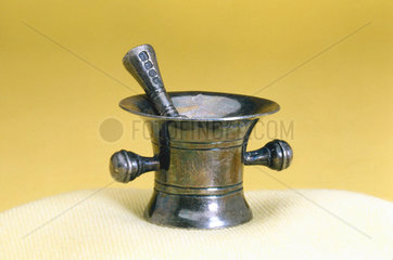 Miniature mortar and pestle  silver  c 1901.