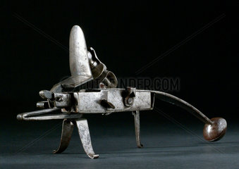 Tinder pistol  all steel grasshopper variety. European  1750-1800.