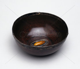 Maple mazer alms bowl  English  c 13th century.