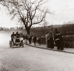 C S Rolls passing spectators during the 1000 Mile Trial  1900.