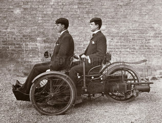 A L Paul (front) and C S Rolls in a 4 hp Bollee Tri-Car  1895.