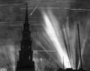 Bombs and searchlights lighting the night sky  London  1 September 1940.