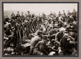 Soldiers eating  c 1915.