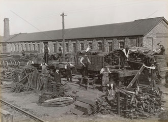 Workers putting wagons together  South Yorkshire  c 1916.