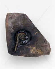 Stone used as floating wick holder  Shetland  19th century.