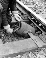 Railway track maintenance  May 1963. This c