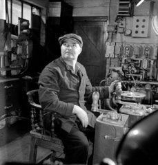 Man at controls in control room inside steel blast furnace  Workington  1948