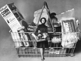 Woman and shopping basket  November 1975.