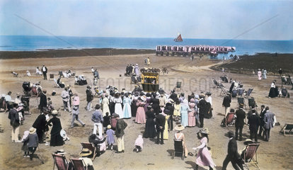 Crowds at the beach  c 1900.