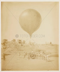 A balloon in a desert setting  1885-1890.