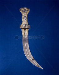 Persian dagger with curved blade of watered steel  18th century.