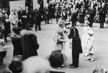 King George VI kisses Queen Mary  26 May 1939.