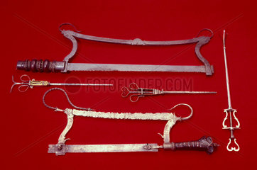 Bullet extractors and amputation saws  17th-18th century.