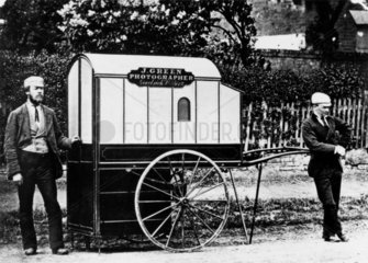 Itinerant photographer with travelling van  c 1874.