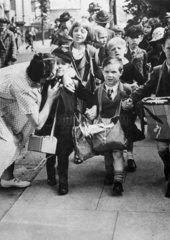 Child evacuees depart  London  1939.