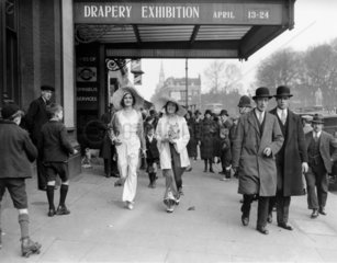 Models wearing beach costumes in the street  London  13 April 1931.