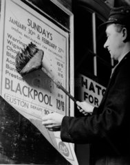 Guard posting a notice  1937.