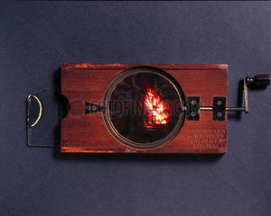 Combined lever and rotary magic lantern slide  19th century.