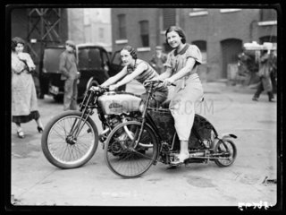 Two women on motorbikes  1935.
