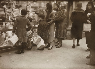 Christmas shopping rush  London  20 December 1933.