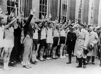 Adolf Hitler inspecting athletes  Germany  1933.