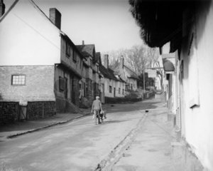 The main street of Kersey in Suffolk  29 January 1934.