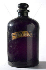 Bottle for storing grape alcohol  English  1840-1900.