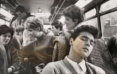 Cliff Richard asleep on a coach while on tour  1963.
