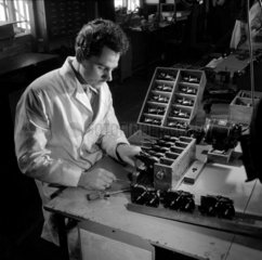 Man assembles 8mm cine cameras  Mitcheldean  1956.