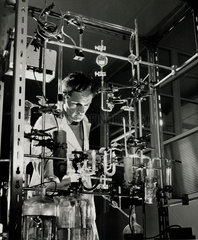 Chemist at APD laboratories in Toxic department with vacuum extractor rig.