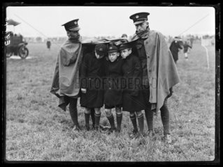 Schoolboys in the rain at an RAF pageant  1936.