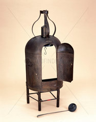 Dutch oven  with basting spoon and cylindrical clockwork jack  1850-1900.