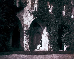 The Reverend Calvert Jones in the cloisters of Lacock Abbey  c 1843.