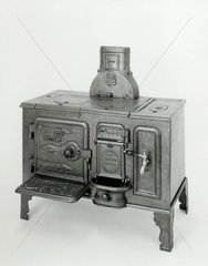 ‘Larbert’ portable cast iron closed cooking range  1900-1930.