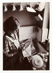 Washing up  c 1935.