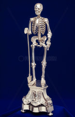 Silver-plated skeleton.
