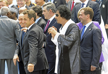 Berlusconi + Sarkozy + Harper + Gaddafi + Medwedew