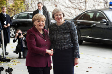 Merkel + May