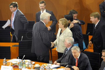 Kretschmann + Merkel