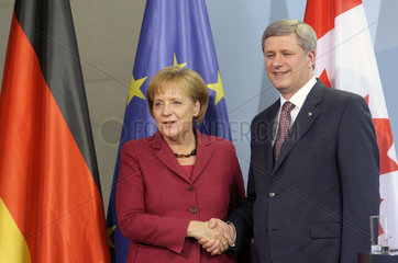 Merkel + Harper