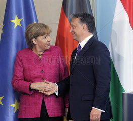Merkel + Orban