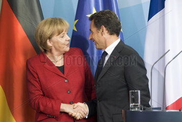 Merkel + Sarkozy